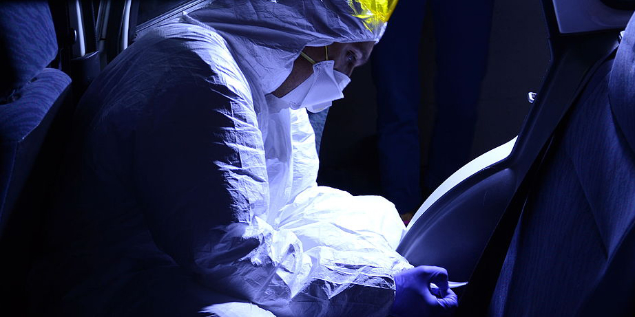 a person wearing a hazmat suit