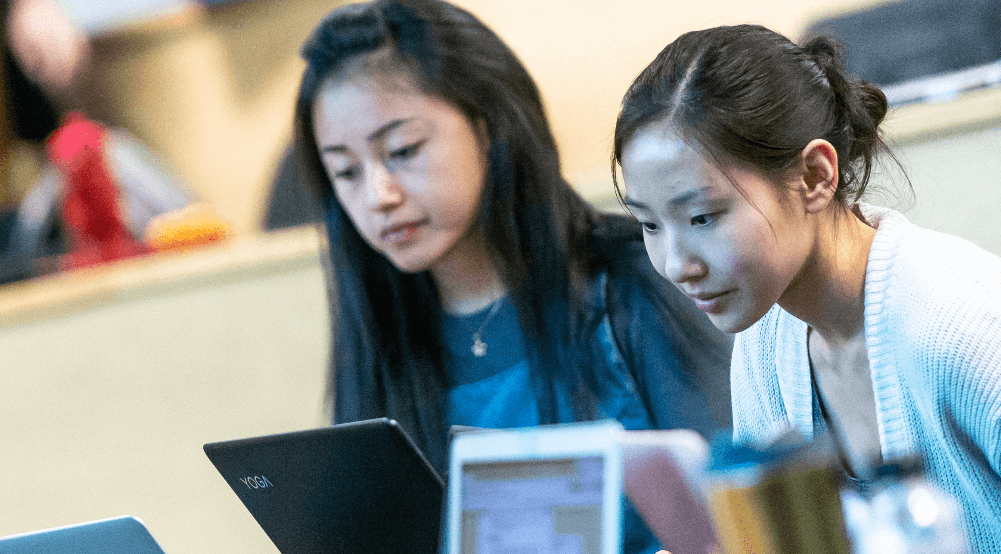 students using laptop to register