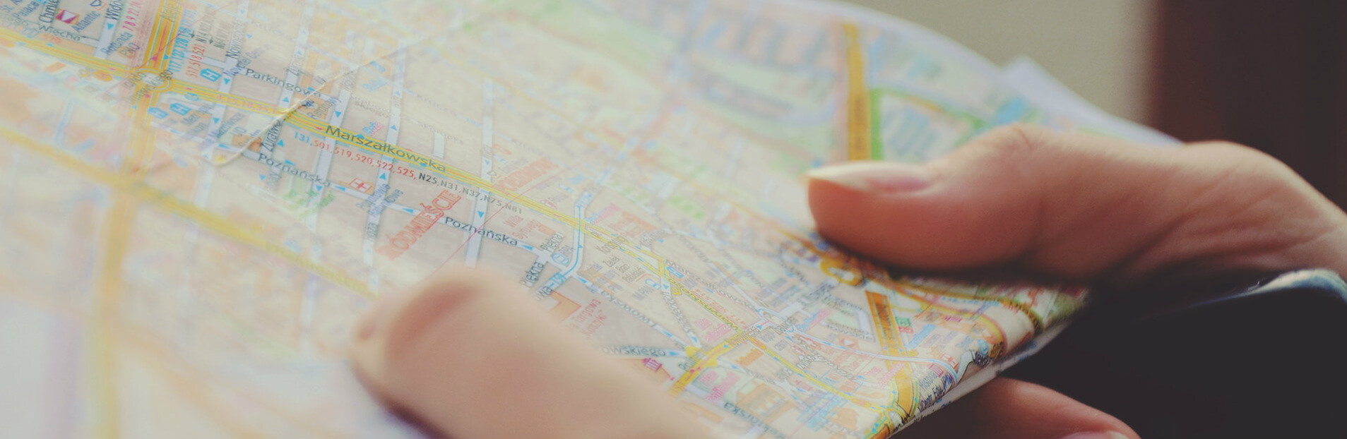 Closeup of hands holding a map