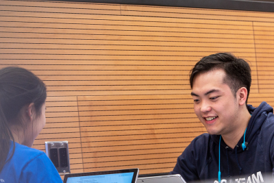 Two students studying at a desk
