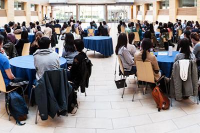 Students sitting at tables