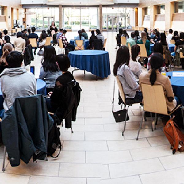 Students sitting at tables