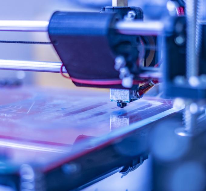 Close up photo of futuristic 3d printer